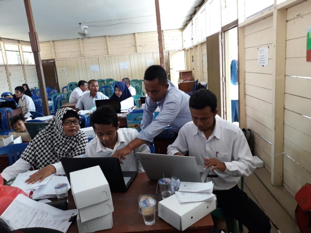 Petugas KP2KP Membantu WP Membuat Laporan eSPT